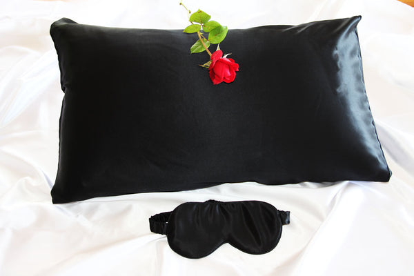 Inky black silk pillow and eye mask set